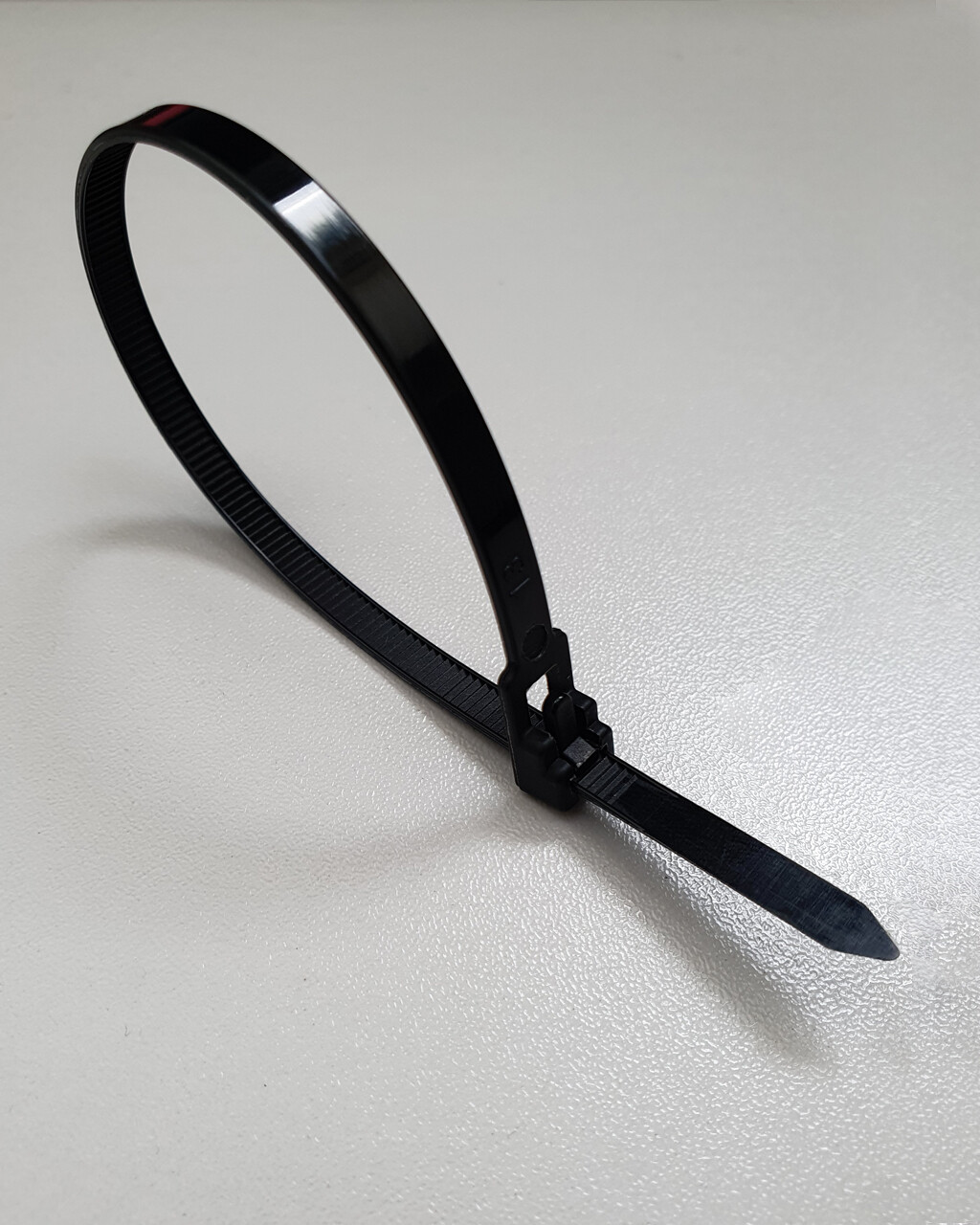 Kábelkötegelő TR CT-110 200×4,8mm, fekete TRIXLINE, 100 db, kioldható Kábelkötegelő TR CT-110 200×4,8mm, fekete TRIXLINE, 100 db, kioldható